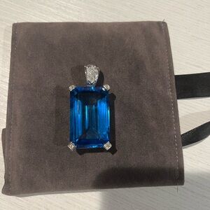 Heavy Hand Made Blue Topaz enhancer. Perfect on a chain The stone is UNTREATED